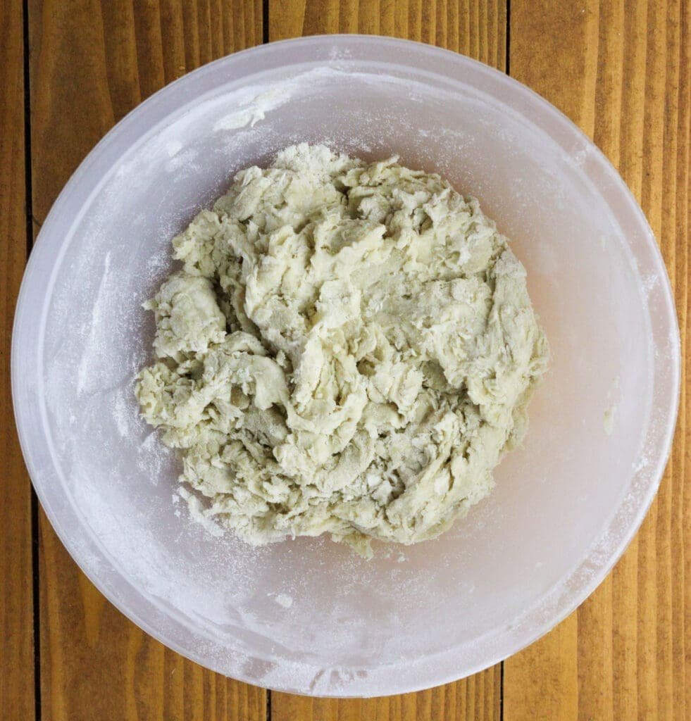 The first strudel dough mixture in a white bowl. 