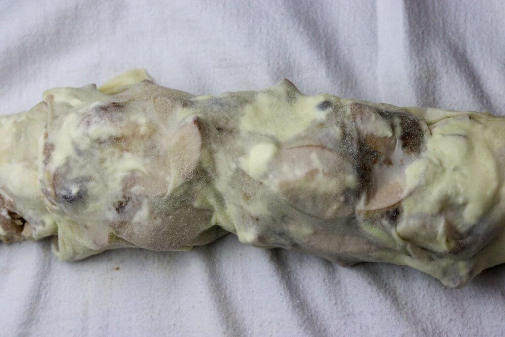 Rolled strudel log before going to the oven. 