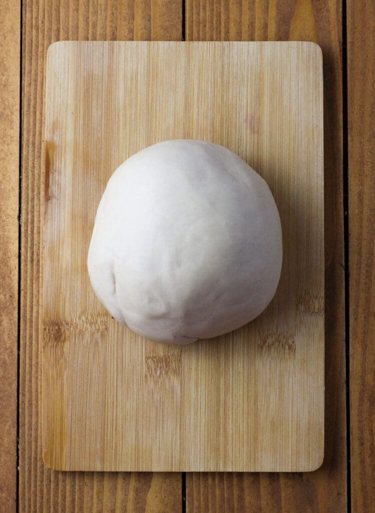 The dough ball just after being kneaded. 