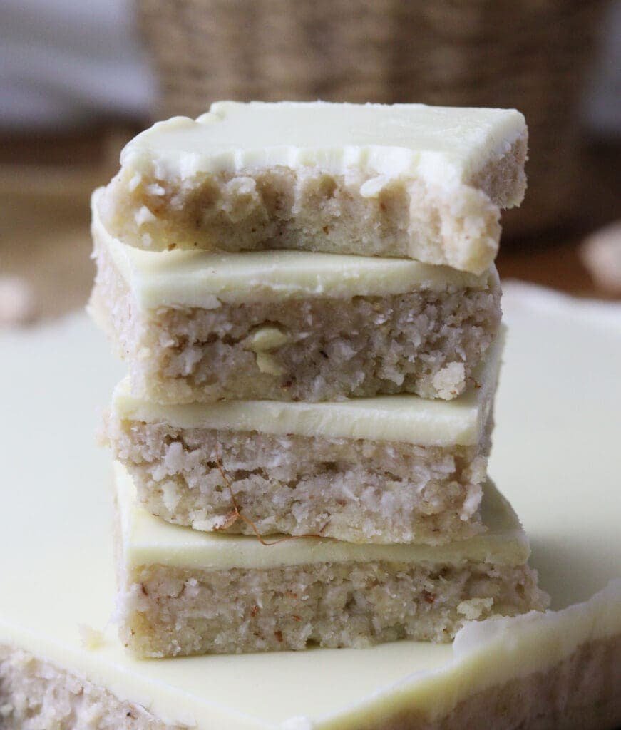 Baobab energy bars with white chocolate stacked on top of each other, a healthy snack made with baobab.