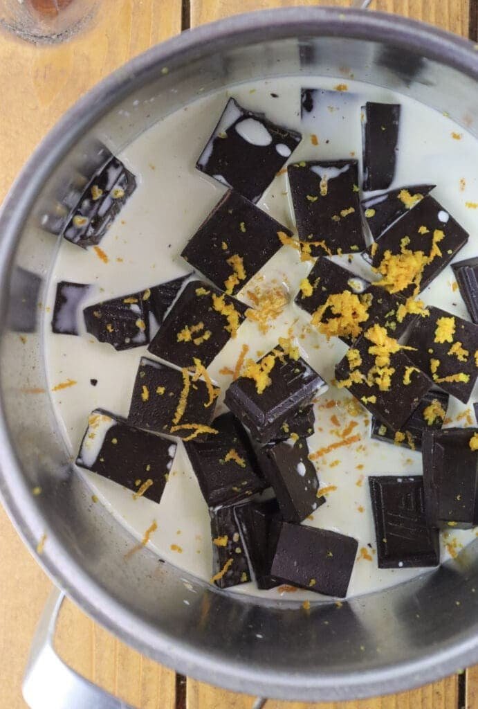 How to make the filling with chocolate, heavy cream and fresh orange zest.