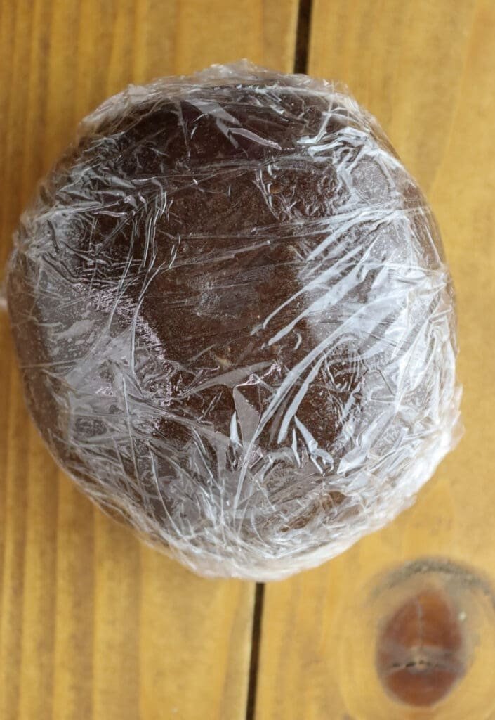 How to wrap a ball of dough to be ready for chilling in the fridge before creating the cookies.
