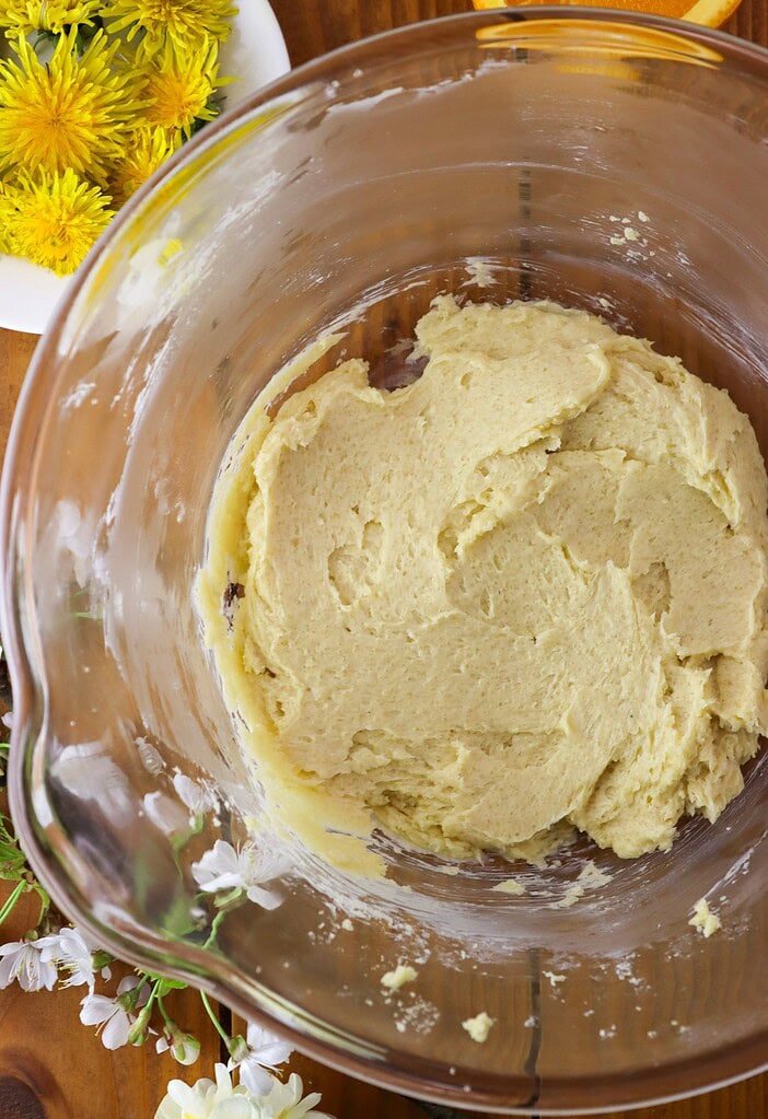 The cookie batter mixed with butter, looking very creamy and fluffy.