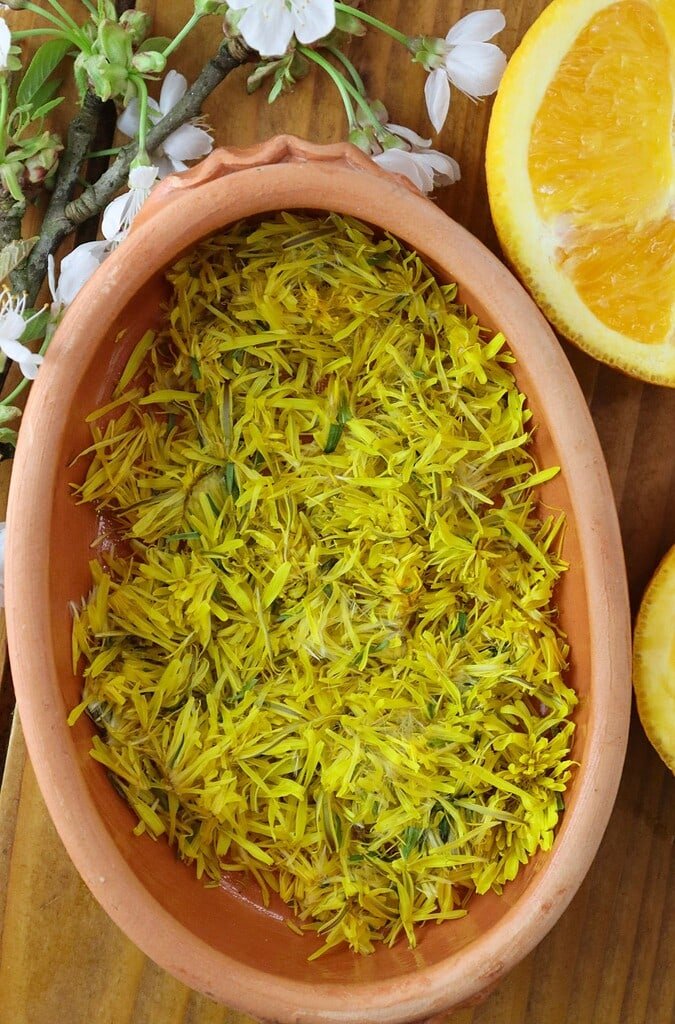 A bowl of fresh dandelion petals, ready to be incorporated into the cookie batter. 