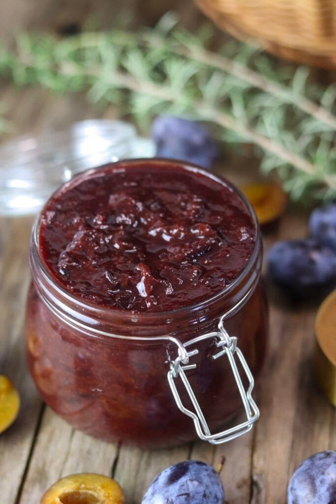An open jar of sugar free plum jam, made by an old canning recipe.