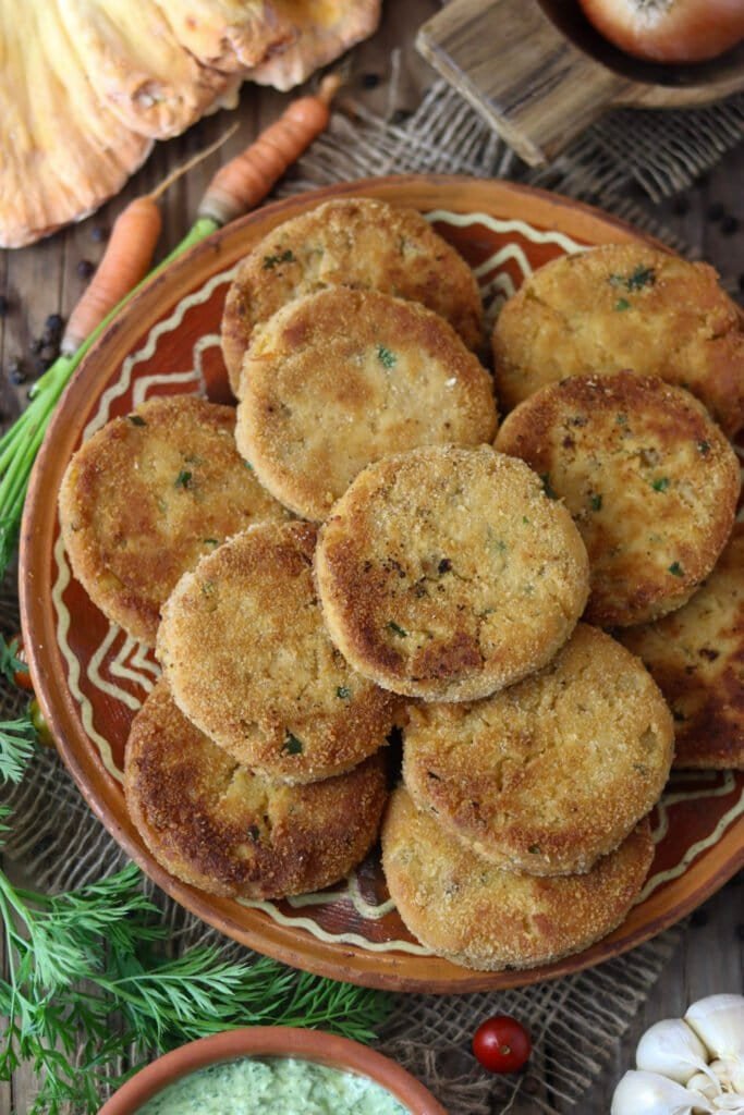 Chicken of the woods mushroom fritters served with a fresh parsley dip.