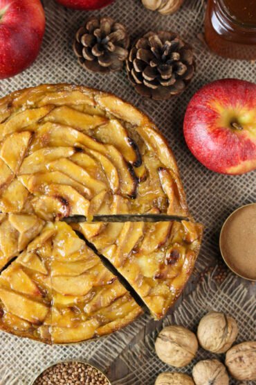 Top view of a buckwheat apple cake recipe, a gluten-free apple cake with honey and a glossy apricot glaze.