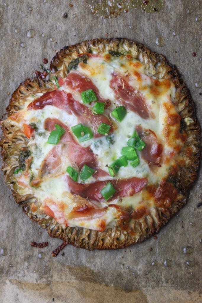 Freshly baked parasol mushroom pizza that just came out of the oven.