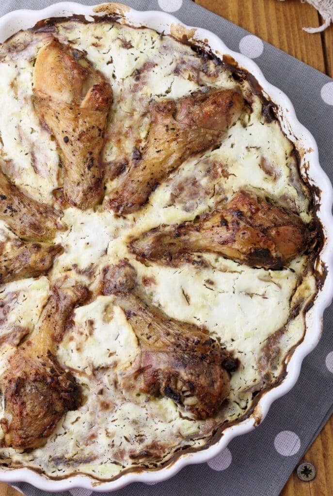 Image showing baked potato kljukuša with chickeng legs in a pie pan