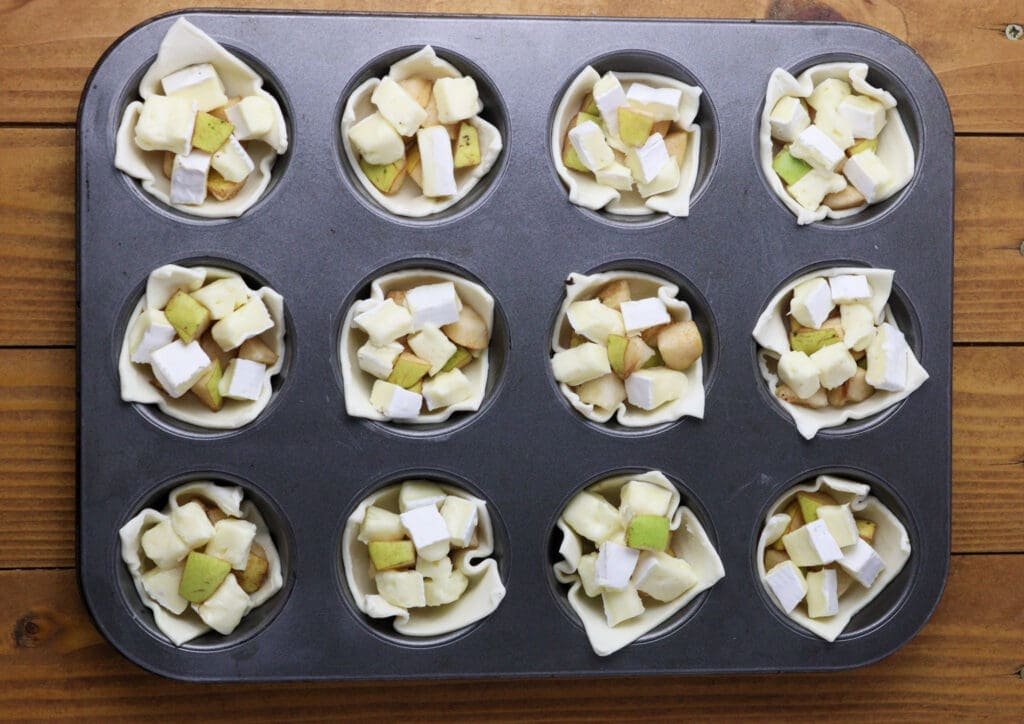 image showing how to fill the bites with pieces of brie cheese and pears