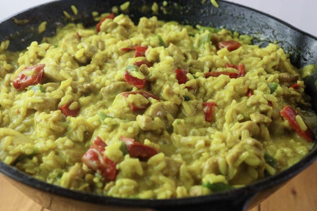 Image of one pot chicken curry and rice cooked and served fresh and hot.