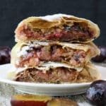 Plum strudel rolls stacked on top of eachoter