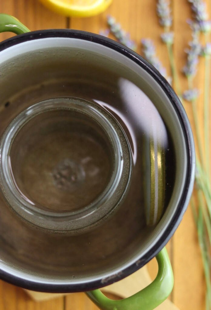 How to sterilize the jars in a pot with boiling water.