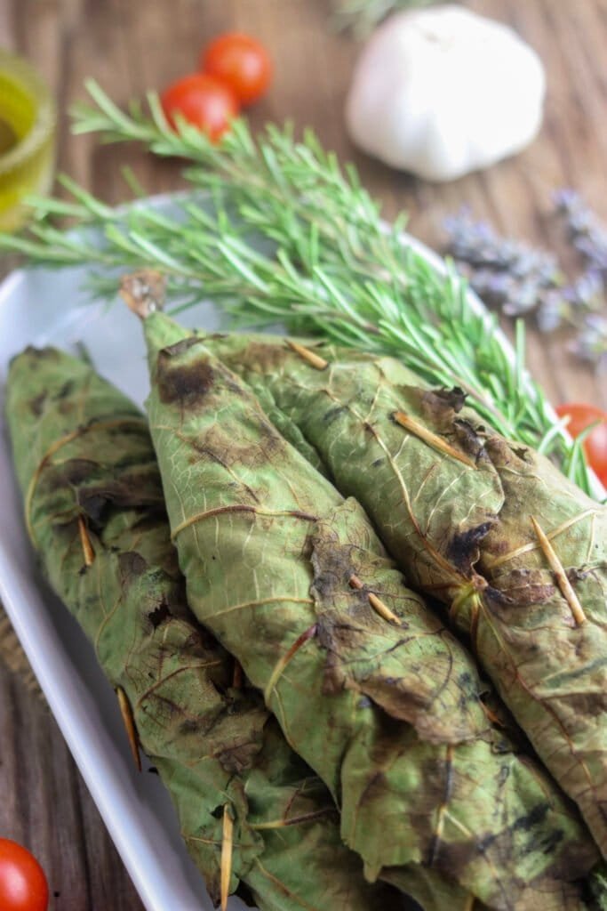 Top view of freshly grilled chub mackerels with rosemary.