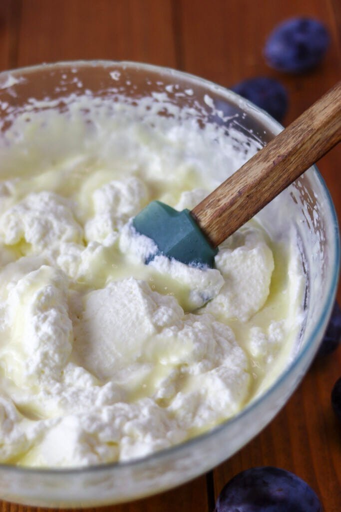 Adding whipped heavy cream to the chocolate cream cheese mixture to create a mousse effect.
